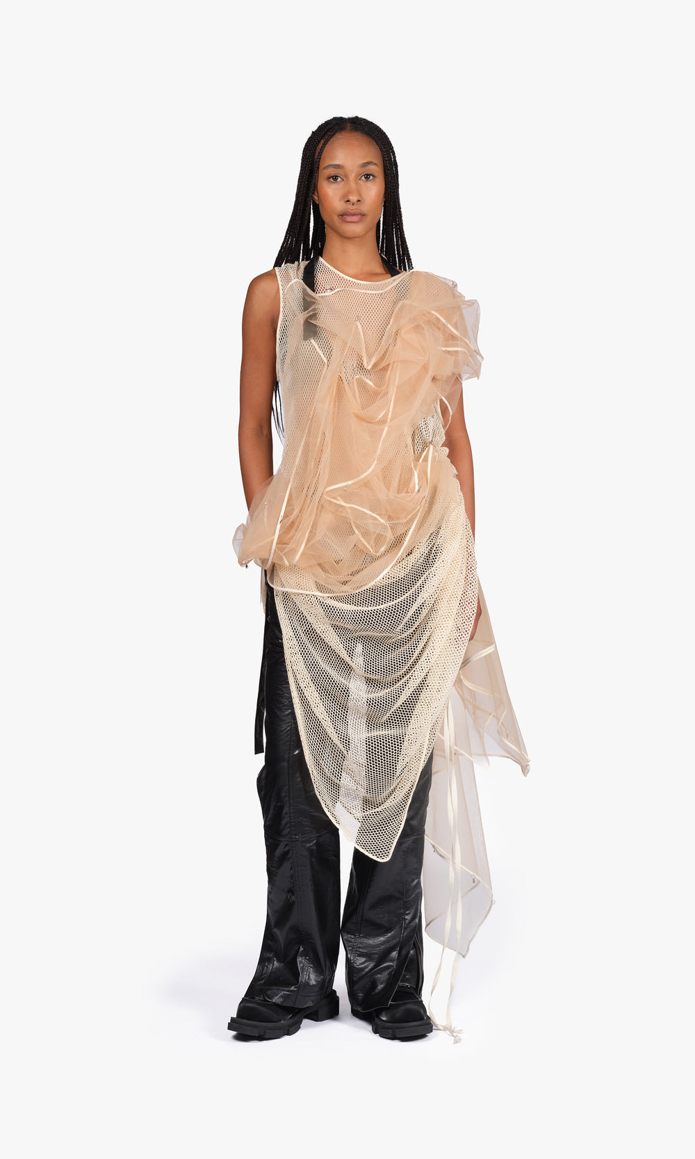 SIEGENTHALER | Front view of the V1 dress in beige mesh, featuring sculptural tulle layering and asymmetrical draping over structured net panels.