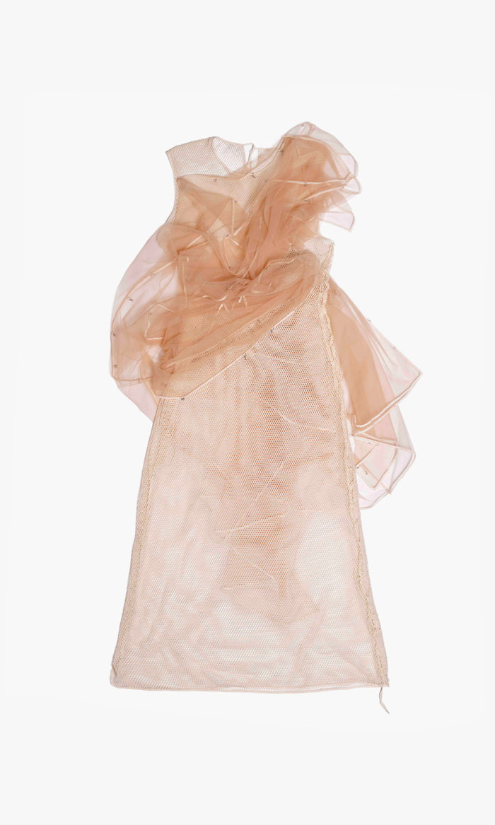 SIEGENTHALER | Front view of the V1 dress in beige mesh, featuring sculptural tulle layering and asymmetrical draping over structured net panels.