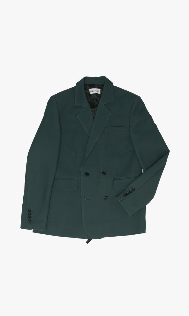 SIEGENTHALER | Front view of the unisex double-breasted suit jacket in dark green wool-silk mikado, showcasing its straight fit and notched lapel.