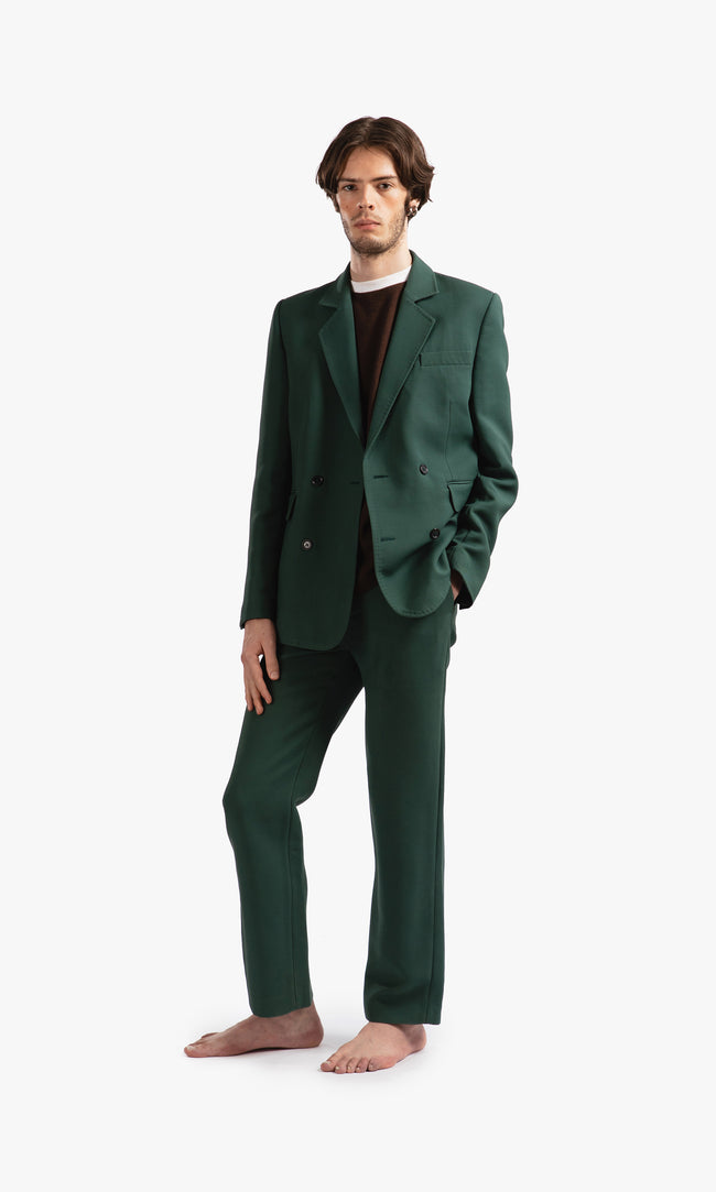 SIEGENTHALER | Front view of the unisex double-breasted suit jacket in dark green wool-silk mikado, showcasing its straight fit and notched lapel.
