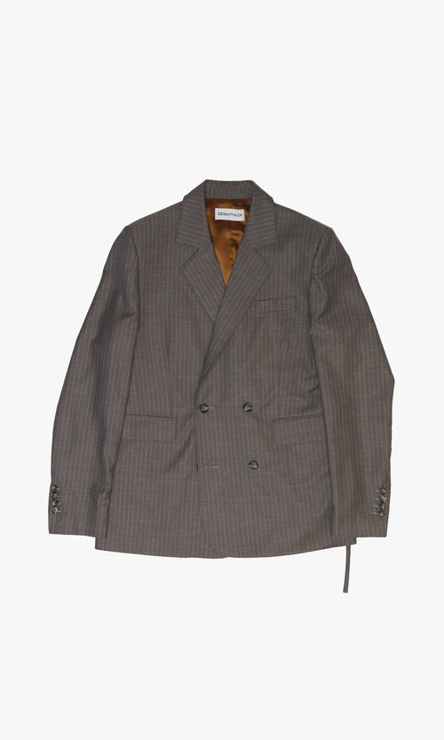 SIEGENTHALER | Front view of the unisex double-breasted suit jacket in grey pinstripe wool, showcasing its straight fit and notched lapel.