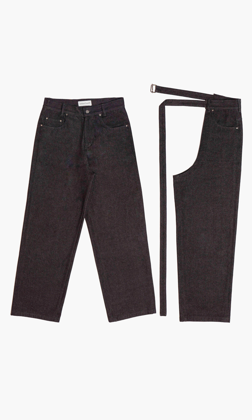  SIEGENTHALER | Dark denim jeans paired with detachable modular chaps. Classic five-pocket cut on the base layer. The overlaid chap leg attaches via a long matching belt, allowing for asymmetric styling or full transformation. Designed to be worn layered or independently.




