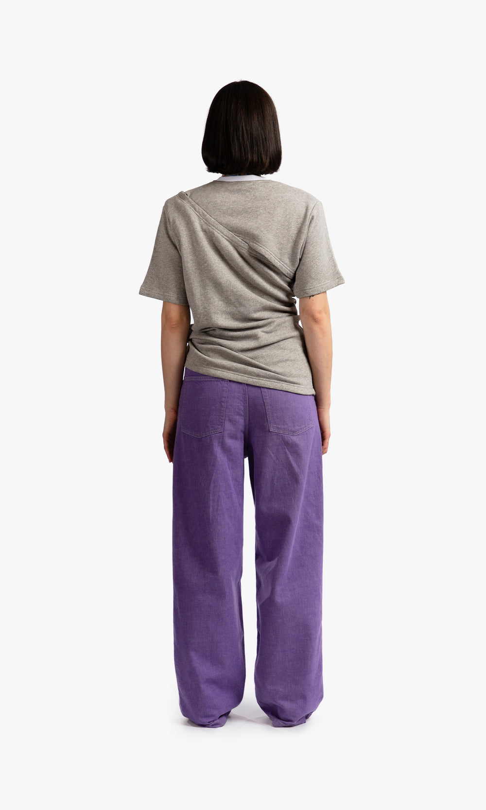 SIEGENTHALER | Back view of the Hildegard T-Shirt in Grey Melange, displaying the seamless construction and drizzle grey melange cotton felpa fabric.