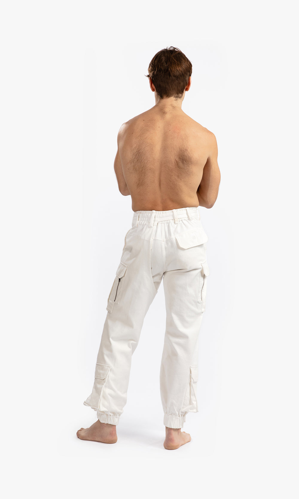 SIEGENTHALER | Back view of the cargo chap in off-white, displaying the relaxed fit and rear design details in stretch cotton gabardine.