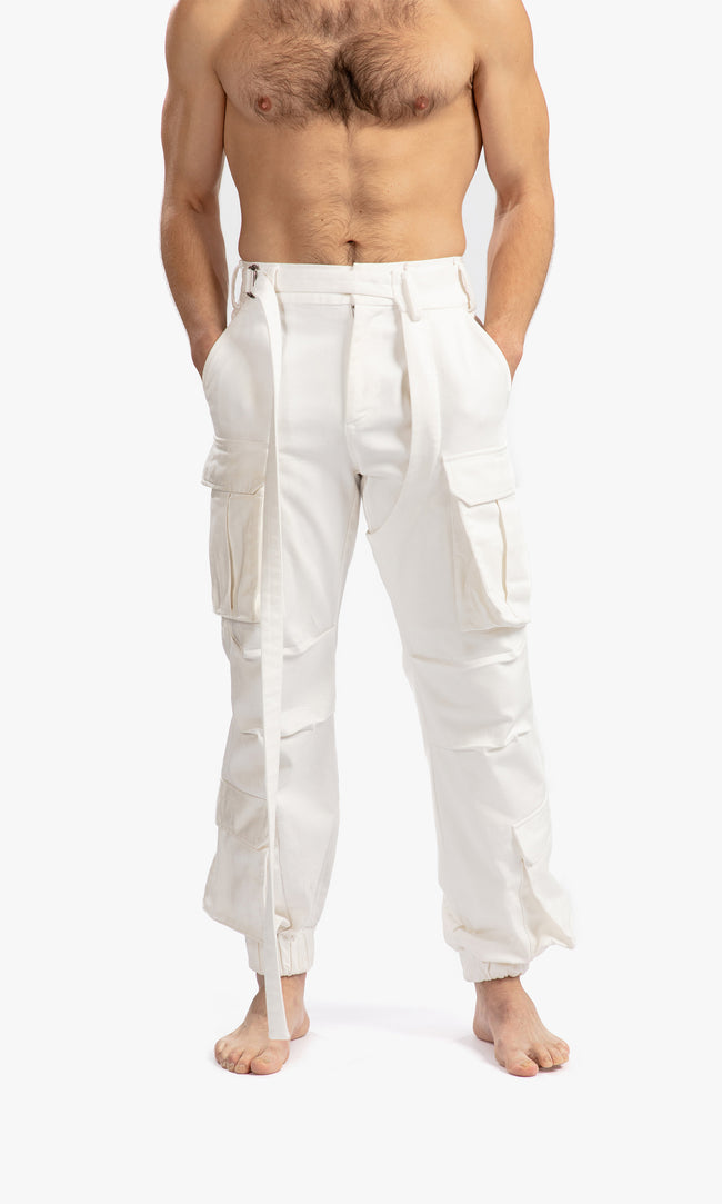 SIEGENTHALER | Front view of the unisex high-waisted cargo chap in off-white stretch cotton gabardine, showcasing its relaxed fit and multiple utility pockets.